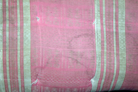 Texture, background, pattern. Fabric is colored in pink and white.の写真素材