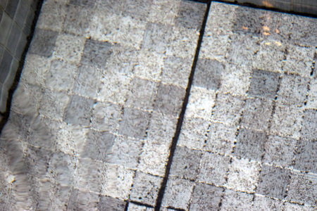 abstract background of tiles in a public park, closeup of photoの写真素材