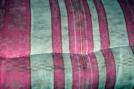 Texture, background, pattern, silk fabric of red color with stripes, lines.の写真素材