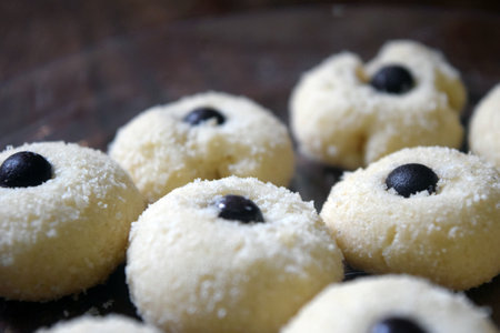 cookies with black olives on a plate, close-upの写真素材