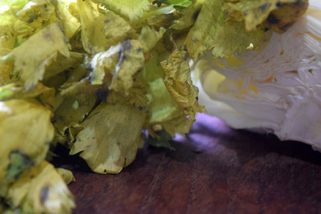 Chinese cabbage with leaves on a wooden table. Selective focus.の写真素材