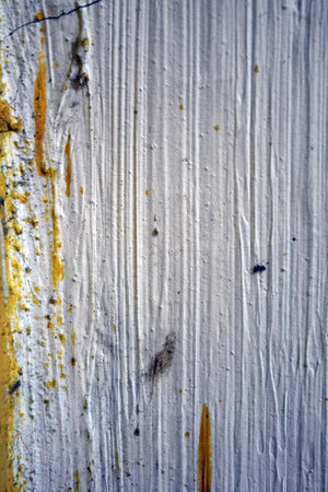 Old white wall with paint stains. Abstract background and texture for design.の写真素材