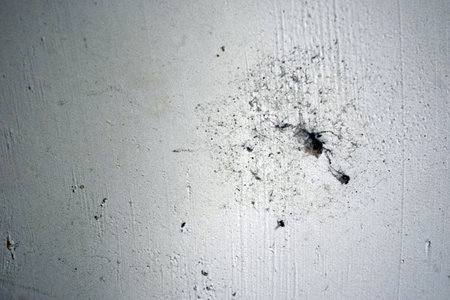 Cracks in the wall of the house, closeup of photoの写真素材