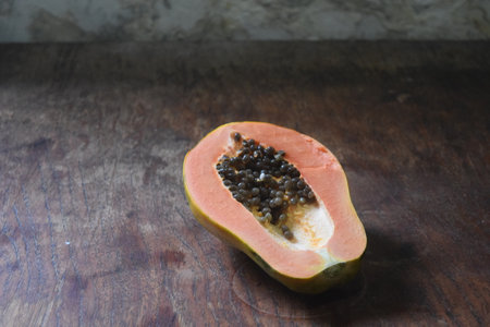 Papaya fruit on wooden background, Healthy and Nutrition Concept.の写真素材