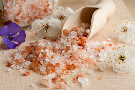 Pink Himalayan sea salt on a wooden tableの写真素材
