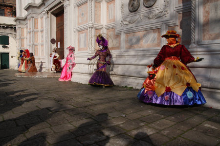 Women in costumes and masks posing at the Venice carneval. Palazzo Ducale, Venice, Italy, 5th March 2011のeditorial素材