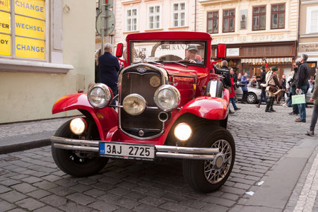 PRAGUE, CZECH REPUBLIC - APRIL 30, 2017: Vintage Ford car in the streets of Pragueのeditorial素材