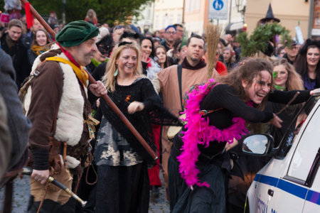 PRAGUE, CZECH REPUBLIC - APRIL 30, 2017: Participants of a costumed parade in the streets of Prague on witch burning night ("carodejnice")のeditorial素材