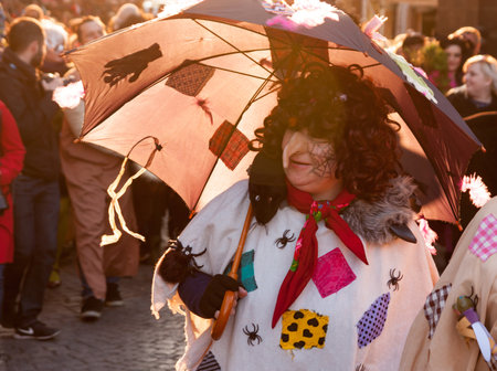 PRAGUE, CZECH REPUBLIC - APRIL 30, 2017: Participants of a costumed parade in the streets of Prague on witch burning night ("carodejnice")のeditorial素材