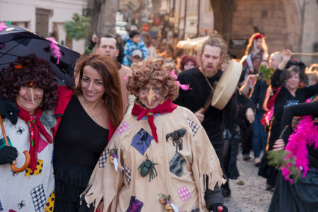 PRAGUE, CZECH REPUBLIC - APRIL 30, 2017: Participants of a costumed parade in the streets of Prague on witch burning night ("carodejnice")のeditorial素材