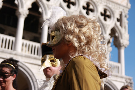 People in costumes and masks at the Venice carnival in Italy. Piazza San Marco, Venice, Italy, 5th March 2011のeditorial素材