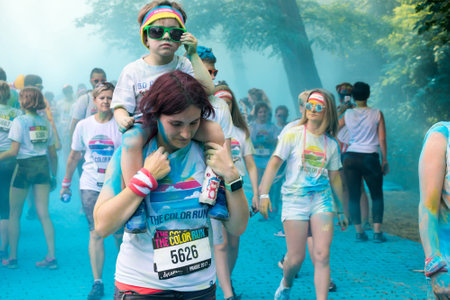 PRAGUE, CZECH REPUBLIC - JUNE 3, 2017: Woman and child participating in the Color Run (a fun race) in Pragueのeditorial素材