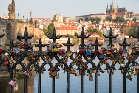 PRAGUE, CZECH REPUBLIC - JUNE 1, 2017: Love locks on a railing near the Charles Bridgeのeditorial素材