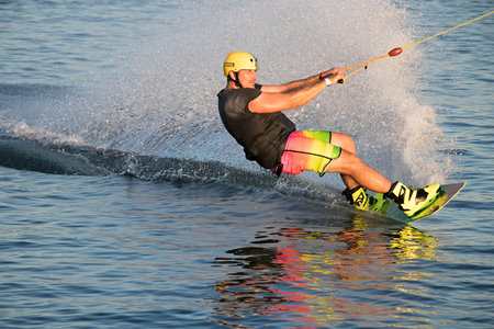 PASOHLAVKY, CZECH REPUBLIC - JUNE 26, 2017: Rider wakeboarding in the cable wake park Wake Merkur in South Moraviaのeditorial素材