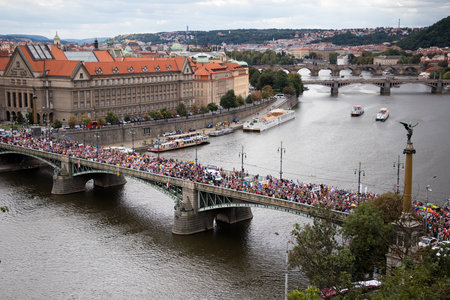 PRAGUE, CZECH REPUBLIC - AUGUST 12, 2017: Participants of the Prague Pride, a big gay & lesbian pride, are crossing one of the Vltava bridgesのeditorial素材