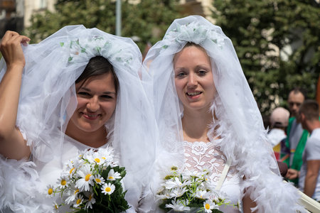 PRAGUE, CZECH REPUBLIC - AUGUST 12, 2017: Two women dressed as brides participating in Prague Pride - a big gay & lesbian prideのeditorial素材