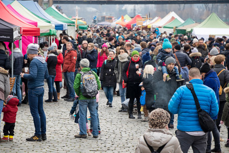 PRAGUE, CZECH REPUBLIC - DECEMBER 16, 2017: People at the popular Naplavka farmers market on the Vltava riverbankのeditorial素材
