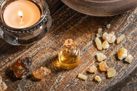 A bottle of frankincense essential oil and resinの写真素材