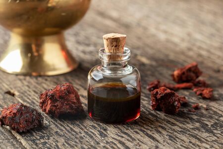 Croton lechleri, or sangre de drago oil and resin on a tableの写真素材