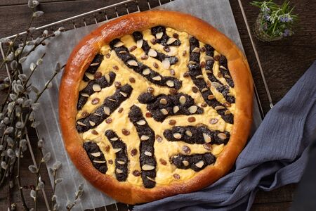 Chodsky kolac - traditional Czech sweet cake made of yeast dough , decorated with ground poppy seeds and curdの写真素材