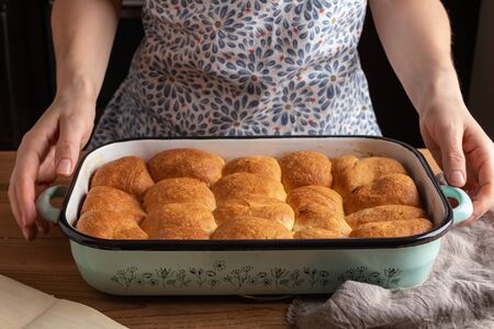 Buchty - typical Czech sweet buns made of yeast dough and filled with ground poppy seeds or curdの写真素材
