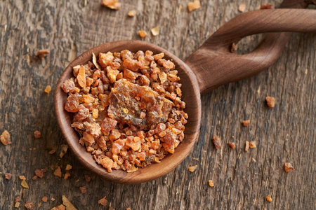 Myrrh resin on a wooden spoonの写真素材