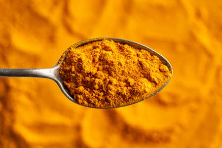 Ground turmeric root, top viewの写真素材