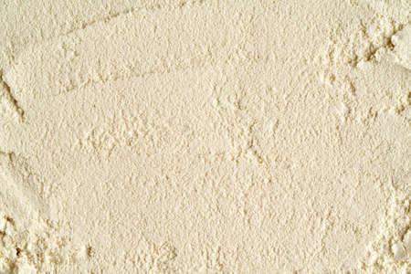 Whey protein powder used as a background - copy space