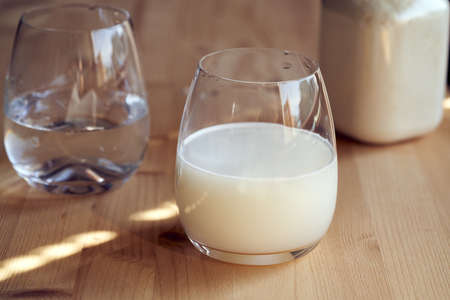 A glass of healthy drink made from whey protein powderの写真素材