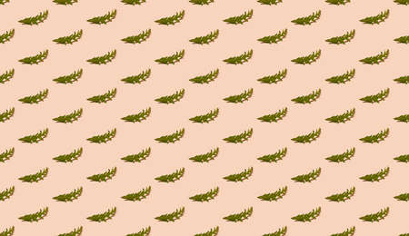 Seamless isometric pattern with green dandelion leaves on pastel orange background. Spring or...