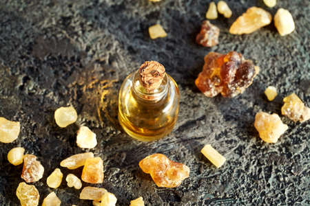 A bottle of aromatherapy essential oil with frankincense resinの写真素材