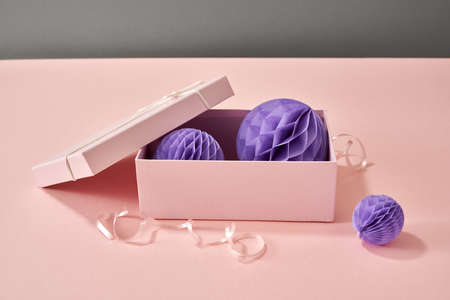 Pastel pink box with pleated paper Christmas ornamentsの写真素材