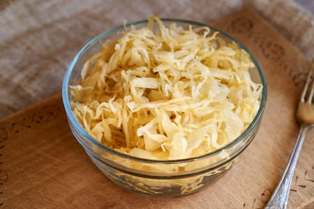 Homemade fermented cabbage in a glass bowl - source of probioticsの写真素材