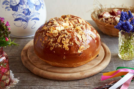 Mazanec - Czech sweet Easter pastry, similar to hot cross bun, with spring flowers and eggs