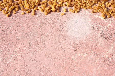 Frankincense resin on a pink background with copy space, top viewの写真素材