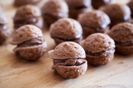 Nut shaped homemade Christmas cookies filled with chocolate creamの写真素材