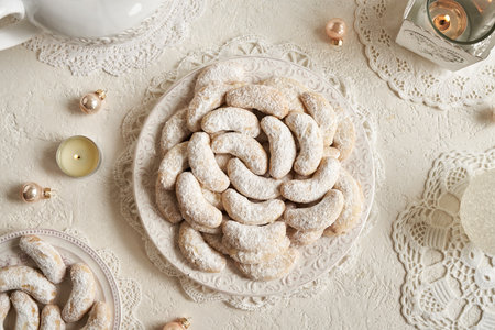 Vanilla crescents - homemade Christmas cookies on a white plate, top viewの写真素材