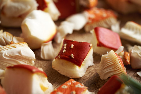 Close up of chopped red fly agaric or amanita mushroom - preparation of herbal tincture, alternative ointment for the jointsの写真素材