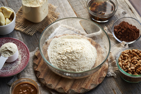 Whey protein powder, raw cacao, chocolate and peanut butter and soaked dates - ingredients for...