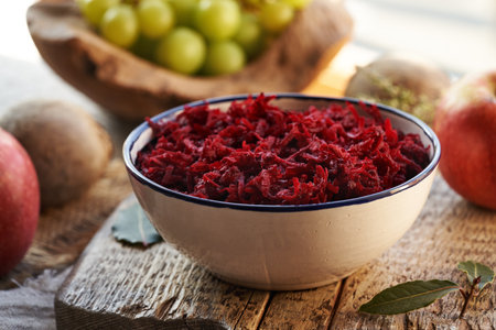 Grated fresh beetroot in a bowl. Healthy vegetable salad.の写真素材