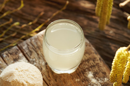 Natural whey drink and powder on a table - source of proteinの写真素材