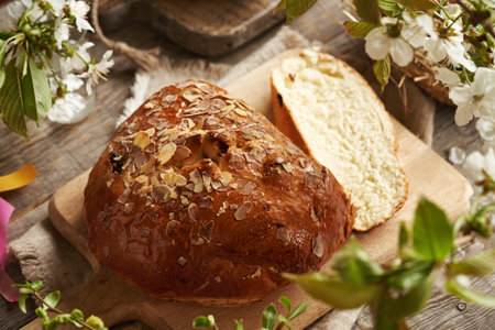 Mazanec, Czech sweet Easter pastry, with cherry blossoms in springtimeの写真素材