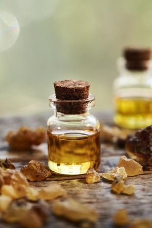 A bottle of frankincense essential oil and resinの写真素材