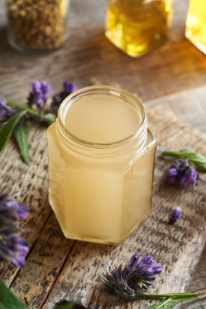 Preparation of comfrey root ointment using hot rendered pork lardの写真素材
