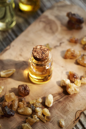 Frankincense essential oil in a transparent glass bottleの写真素材