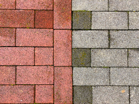 Color wet pavement. Urban background and texture red and grey bricks wall floorの写真素材