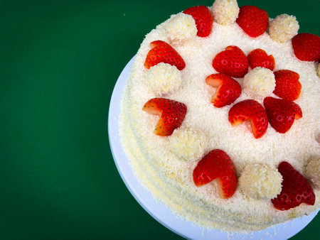 Valentines Day Anniversary Marriage Wedding Cake Raffaello with heart shaped strawberries desiccated gateau flan coconutの写真素材