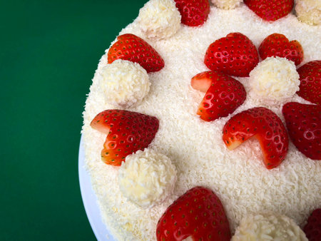 Valentines Day Anniversary Marriage Wedding Cake Raffaello with heart shaped strawberries desiccated flan coconutの写真素材