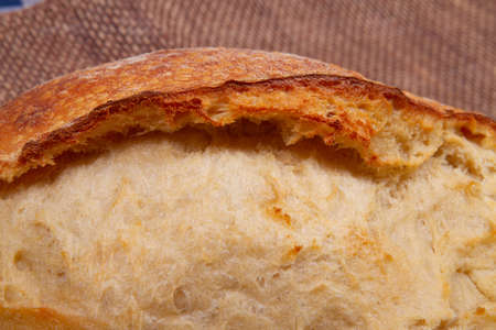 golden brown crust of homemade bread close upの写真素材