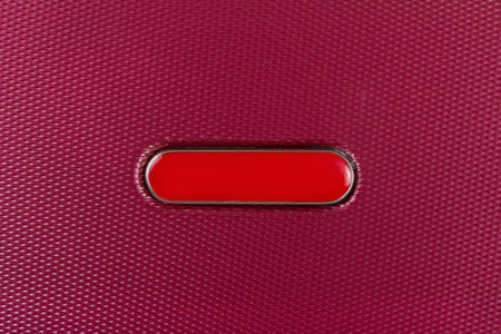 Close-up of purple plastic texture with red labelの写真素材